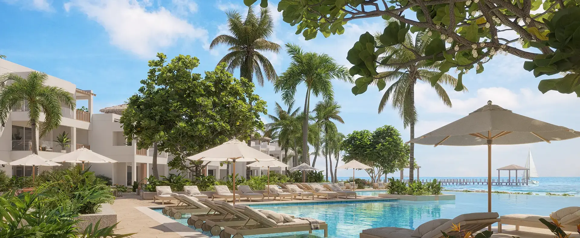 Pool and beach at Watercolors D4 beachfront condo, West Bay, Roatan