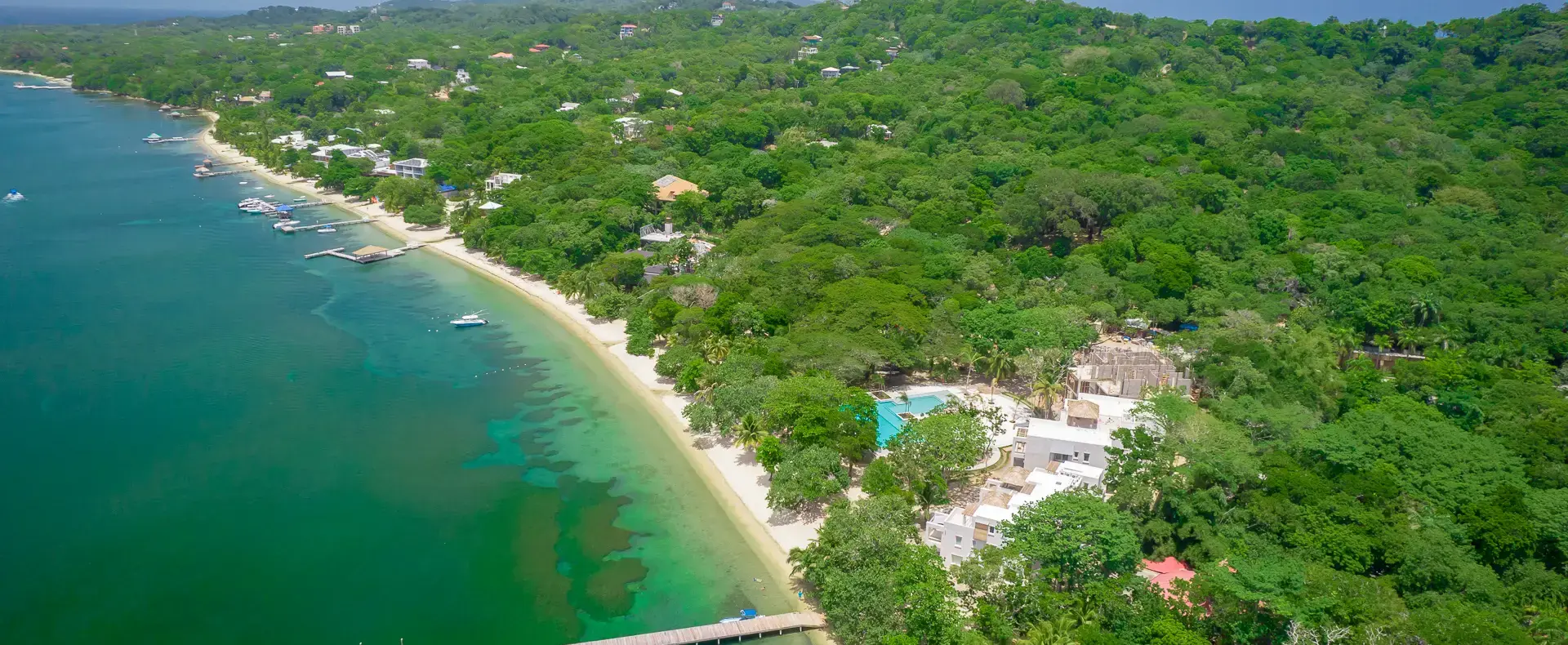 Aerial view of West Bay beach and Watercolors residences, Roatan