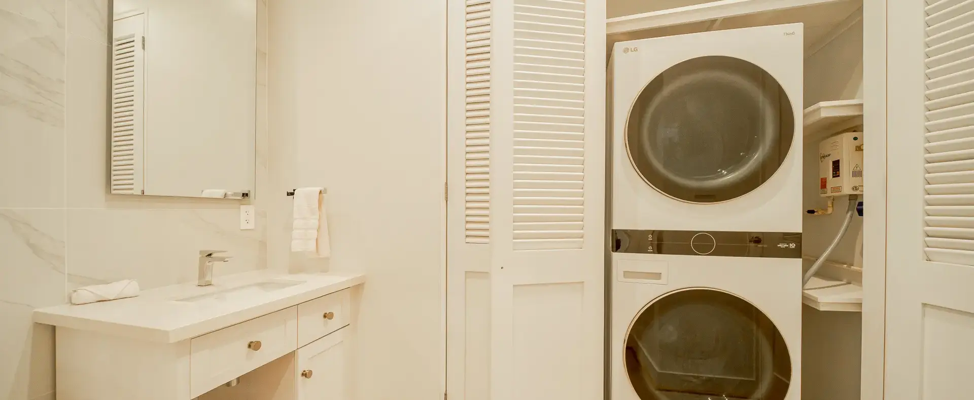 Laundry area with washer and dryer, Watercolors D4 condo