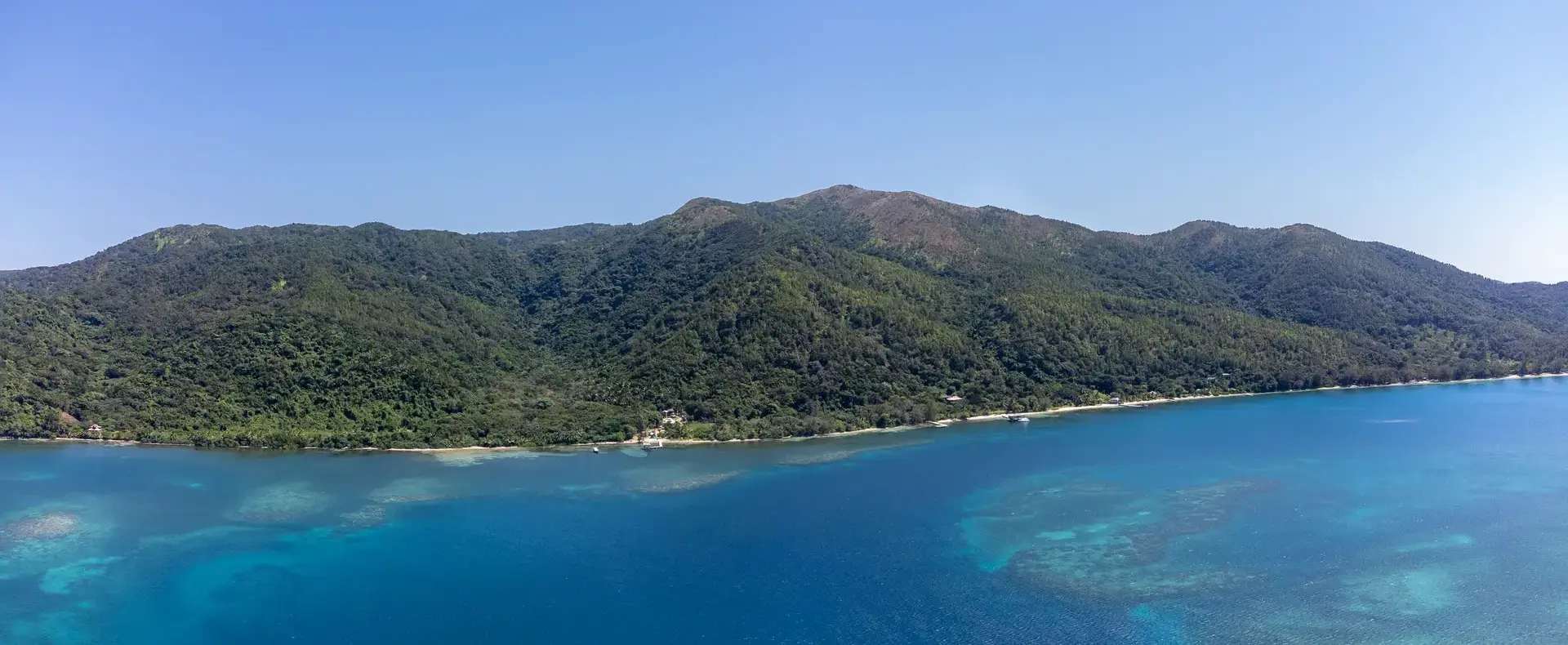 Green hills and turquoise water of Guanaja Island, 482-acre property