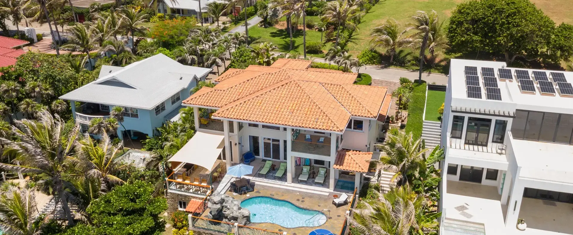 Aerial view of the home, pool and tropical garden at Casa Cascada