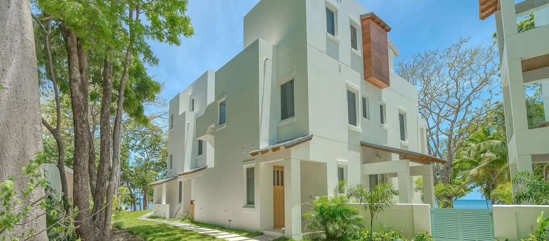 Watercolors condo building with landscaped garden walkway