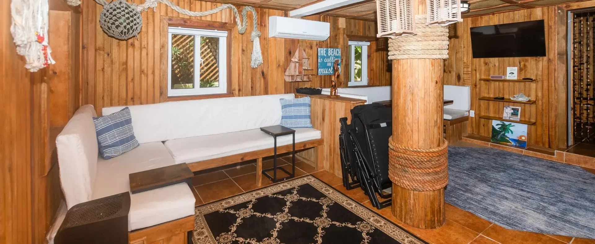 Guest apartment living area with tropical wood interior