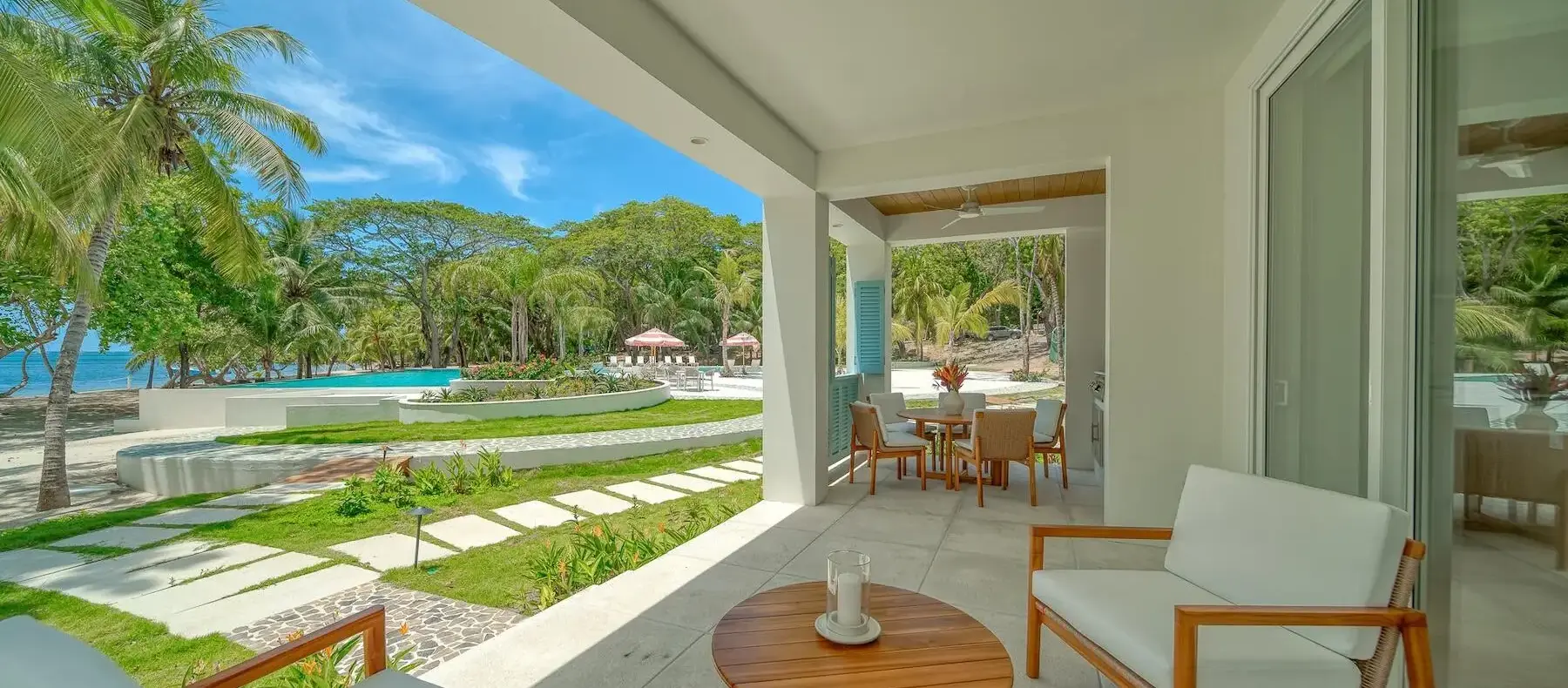 Terrace seating with view toward the pool (sample unit)